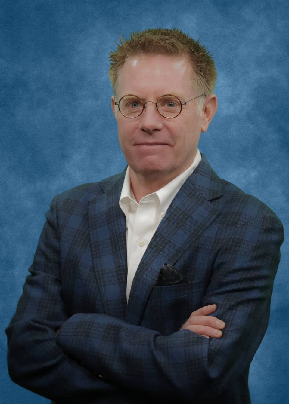 Paul Headshot Blue 1.jpg